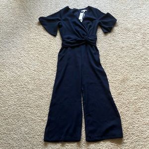 NEVER WORN. BRAND NEW! Navy Jumpsuit